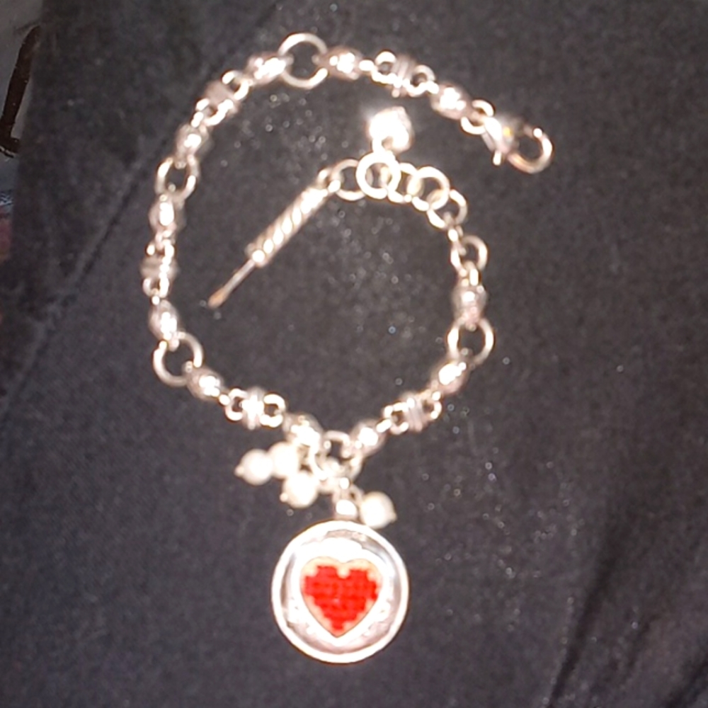 Brighton memento charm bracelet including 1st heart shape photo charm.